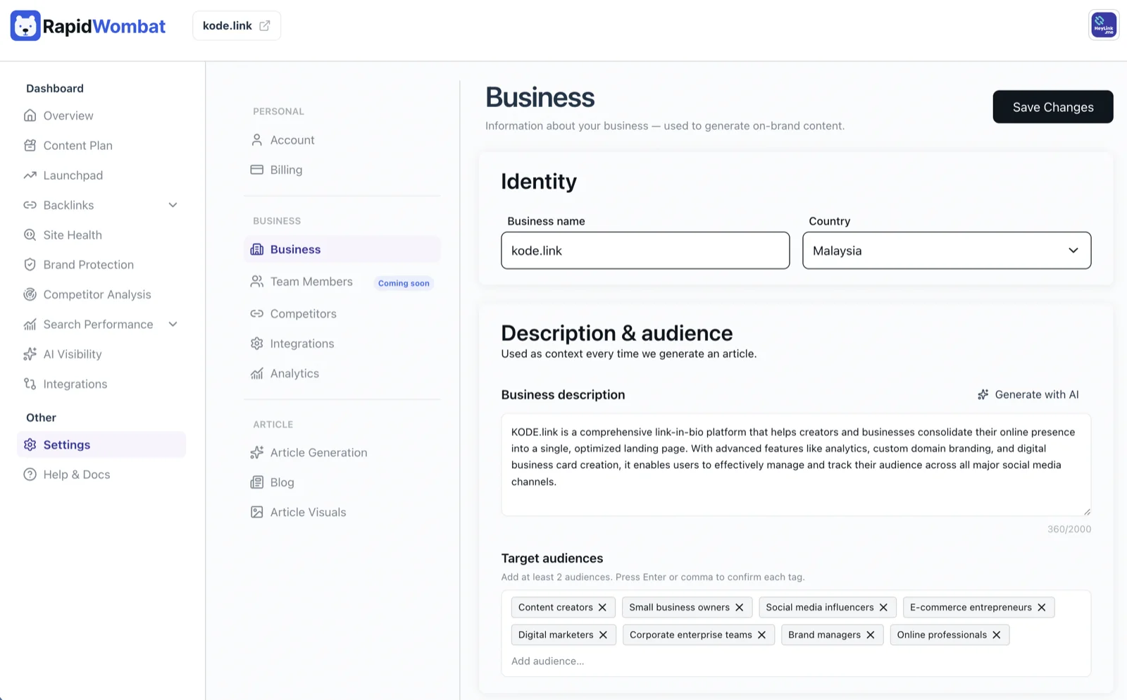 The Business settings page with identity, description, and audience sections